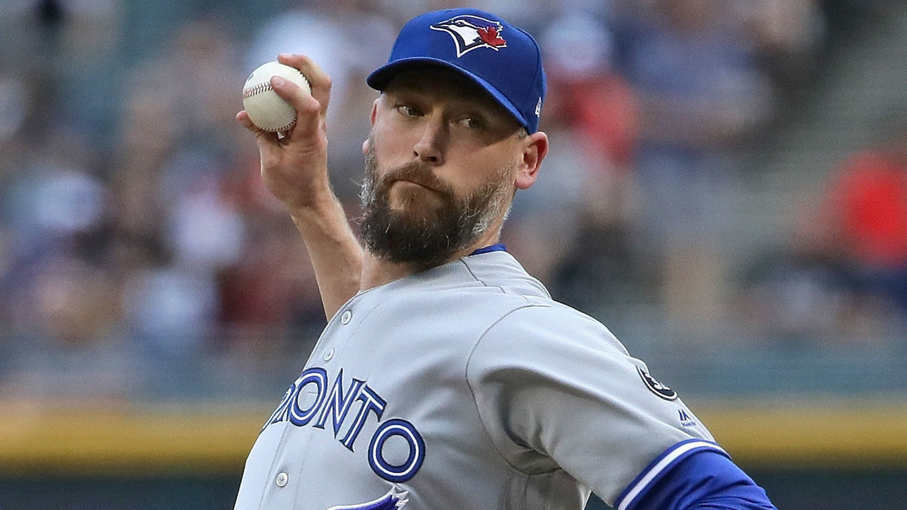 CHICAGO, IL - JULY 28: Starting pitcher John Axford #77 of the Toronto Blue Jays delivers the ball in the first start of his career against the Chicago White Sox at Guaranteed Rate Field on July 28, 2018 in Chicago, Illinois.
