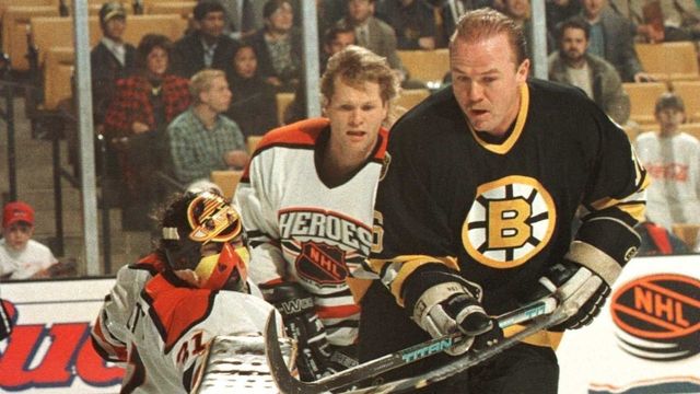 19 Jan 1996: Rick Middleton #16 of the Boston Bruin Heroes and Brian Engblom #3 of the NHL Heroes watch as Middleton''s shot is deflected off of goalie John Garrett #31 during the first period of the NHL Heroes of Hockey game played at the Fleet Center in