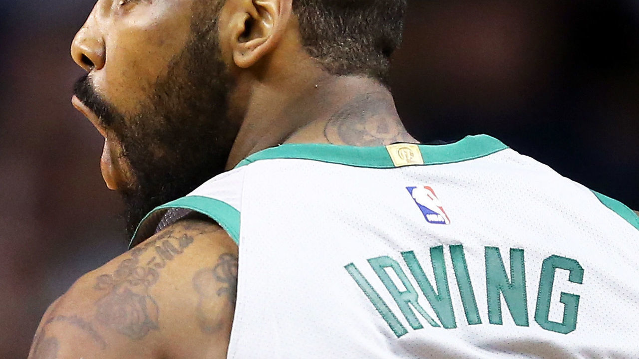 BOSTON, MA - FEBRUARY 11: Kyrie Irving #11 of the Boston Celtics reacts during a game against the Cleveland Cavaliers at TD Garden on February 11, 2018 in Boston, Massachusetts.