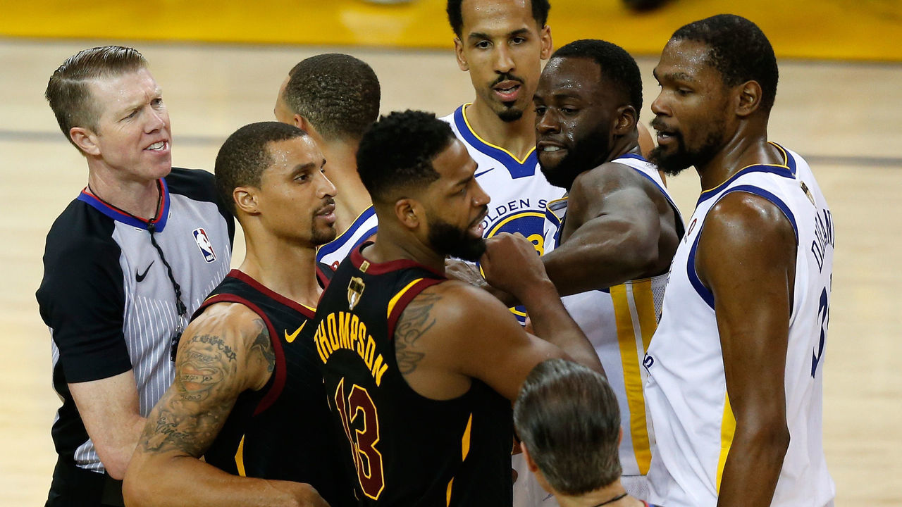 OAKLAND, CA - MAY 31: Tristan Thompson #13 of the Cleveland Cavaliers and Draymond Green #23 of the Golden State Warriors get involved in a altercation in overtime during Game 1 of the 2018 NBA Finals at ORACLE Arena on May 31, 2018 in Oakland, California.