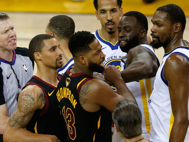 OAKLAND, CA - MAY 31: Tristan Thompson #13 of the Cleveland Cavaliers and Draymond Green #23 of the Golden State Warriors get involved in a altercation in overtime during Game 1 of the 2018 NBA Finals at ORACLE Arena on May 31, 2018 in Oakland, California.