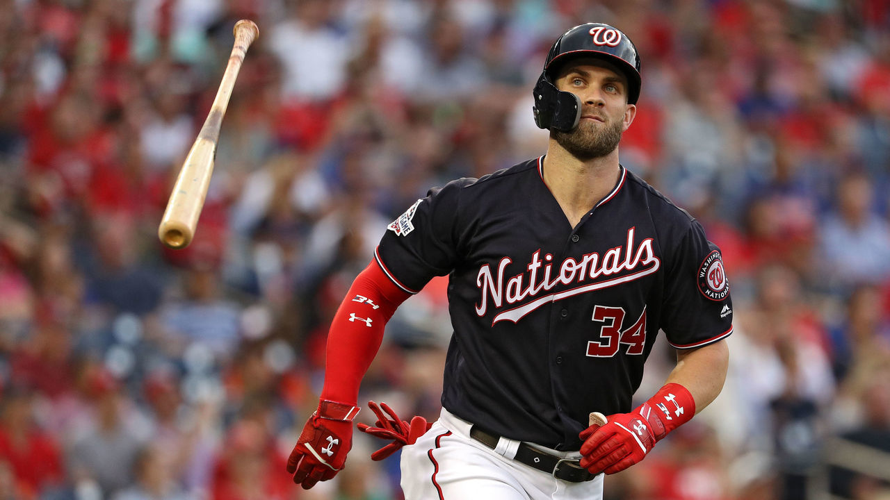 WASHINGTON, DC - JULY 31: Bryce Harper #34 of the Washington Nationals tosses his bat after flying out against the New York Mets during the second inning at Nationals Park on July 31, 2018 in Washington, DC.