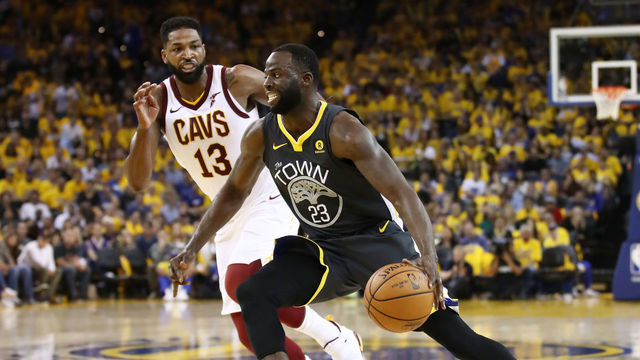 OAKLAND, CA - JUNE 03: Draymond Green #23 of the Golden State Warriors drives against Tristan Thompson #13 of the Cleveland Cavaliers in Game 2 of the 2018 NBA Finals at ORACLE Arena on June 3, 2018 in Oakland, California.