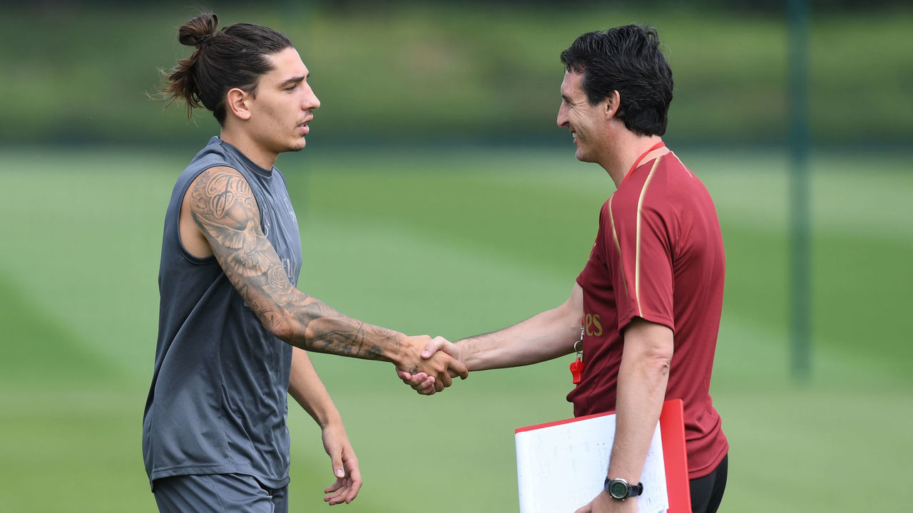 ST ALBANS, ENGLAND - JULY 04: Arsenal Head Coach Unai Emery and Hector Bellerin during a training session at London Colney on July 4, 2018 in St Albans, England.