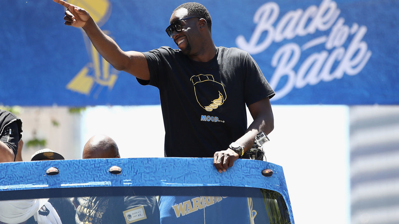 OAKLAND, CA - JUNE 12: Draymond Green #23 of the Golden State Warriors gestures to the crowd during the Golden State Warriors Victory Parade on June 12, 2018 in Oakland, California. The Golden State Warriors beat the Cleveland Cavaliers 4-0 to win the 2018 NBA Finals.