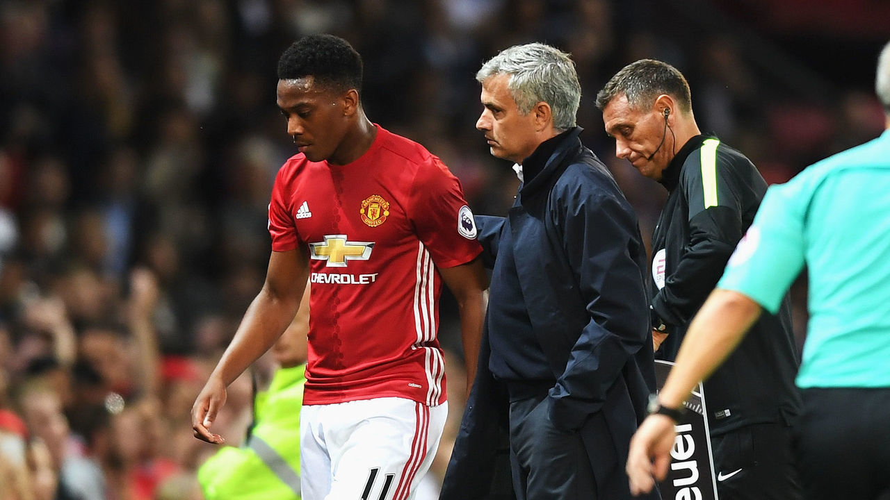 MANCHESTER, ENGLAND - AUGUST 19: Anthony Martial of Manchester United is substituted by Jose Mourinho, Manager of Manchester United during the Premier League match between Manchester United and Southampton at Old Trafford on August 19, 2016 in Manchester, England.