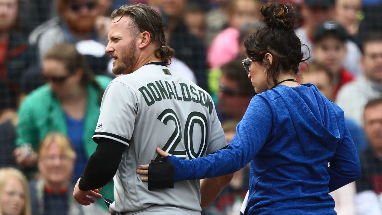 BOSTON, MA - MAY 28: Josh Donaldson #20 of the Toronto Blue Jays leaves the game and is replace by pinch runner Giovanny Urshela #3 of the Toronto Blue Jays in the top of the fifth inning of the game against the Boston Red Sox at Fenway Park on May 28, 2018 in Boston, Massachusetts. MLB Players across the league are wearing special uniforms to commemorate Memorial Day.