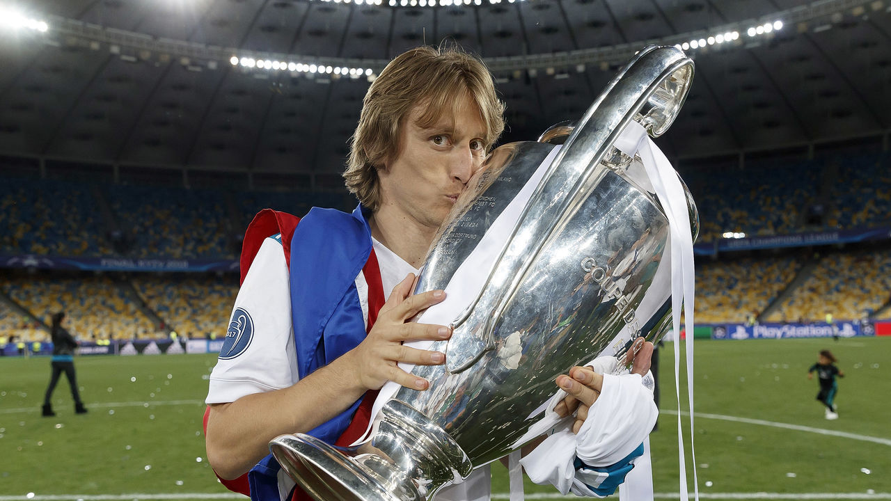 KIEV, UKRAINE - MAY 26: Luka Modric of Real Madrid celebrates with The UEFA Champions League trophy following his sides victory in the UEFA Champions League Final between Real Madrid and Liverpool at NSC Olimpiyskiy Stadium on May 26, 2018 in Kiev, Ukraine.