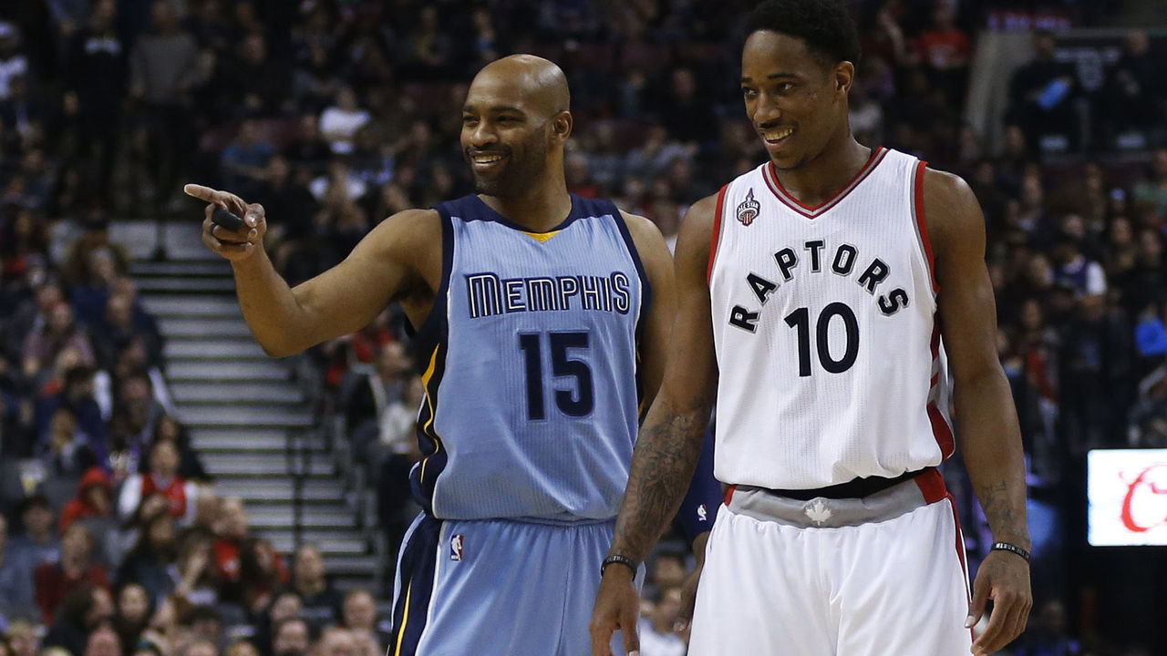 TORONTO, ON - FEBRUARY 21 - Memphis Grizzlies guard Vince Carter and Toronto Raptors guard DeMar DeRozan share a laugh during the first half of their NBA game at the Air Canada Centre in Toronto, Ontario, February 21, 2016. Toronto Star/Melissa (Melissa Renwick/Toronto Star via Getty Images)
