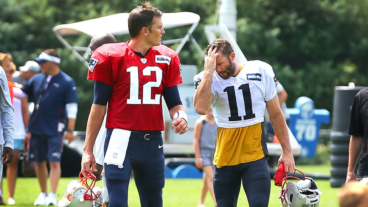 FOXBOROUGH, MA - JULY 28: New England Patriots quarterback Tom Brady, left, and teammate Julian Edelman walk off the field at the end of the day of Patriots training camp at the Gillette Stadium practice facility in Foxborough, MA on July 28, 2018.