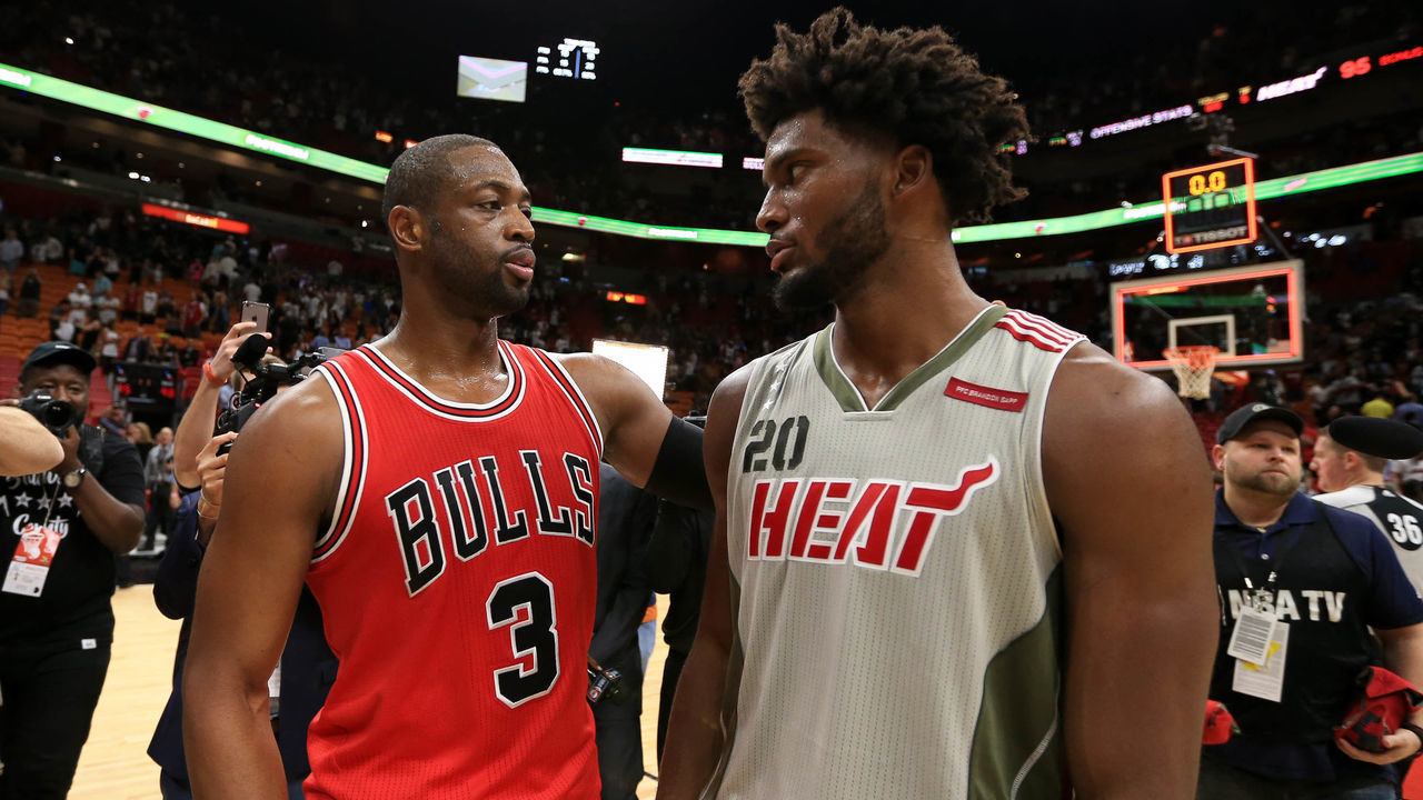 MIAMI, FL - NOVEMBER 10: Dwyane Wade #3 of the Chicago Bulls talks with Justise Winslow #20 of the Miami Heat after the game at American Airlines Arena on November 10, 2016 in Miami, Florida.
