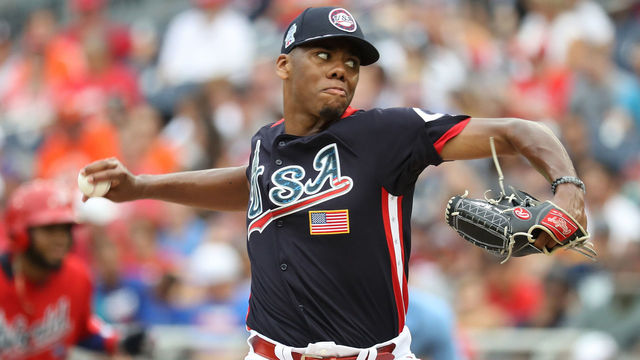 WASHINGTON, DC - JULY 15: Hunter Greene #3 pitches against the World Team during the SiriusXM All-Star Futures Game at Nationals Park on July 15, 2018 in Washington, DC.