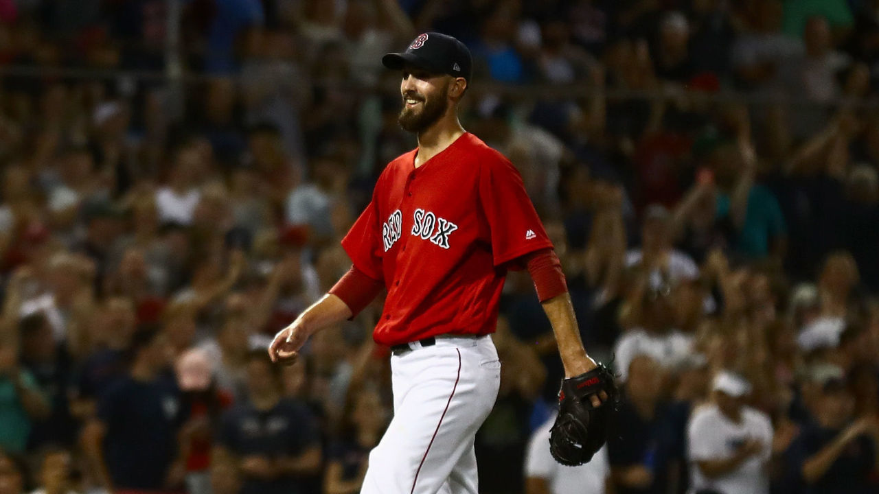 BOSTON, MA - AUGUST 03: Rick Porcello #22 of the Boston Red Sox smiles as he walks of the mound in the ninth inning of the game and victory over the New York Yankees at Fenway Park on August 3, 2018 in Boston, Massachusetts.