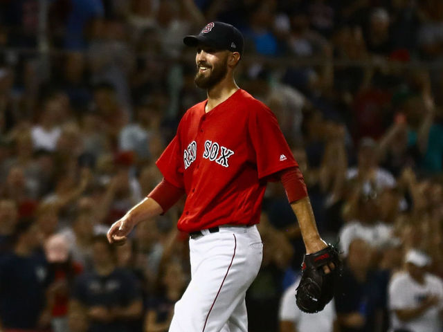 BOSTON, MA - AUGUST 03: Rick Porcello #22 of the Boston Red Sox smiles as he walks of the mound in the ninth inning of the game and victory over the New York Yankees at Fenway Park on August 3, 2018 in Boston, Massachusetts.
