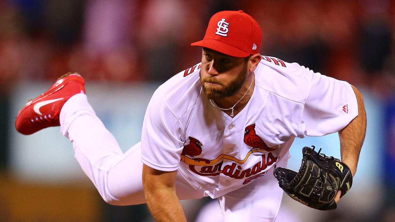 ST. LOUIS, MO - APRIL 9: Greg Holland #56 of the St. Louis Cardinals delivers a pitch against the Milwaukee Brewers in the tenth inning at Busch Stadium on April 9, 2018 in St. Louis, Missouri.