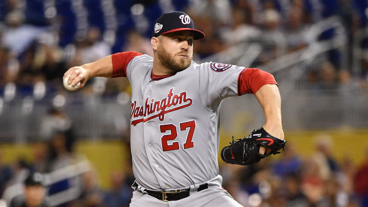 MIAMI, FL - JULY 26: Shawn Kelley #27 of the Washington Nationals pitches in the ninth inning against the Miami Marlins at Marlins Park on July 26, 2018 in Miami, Florida.
