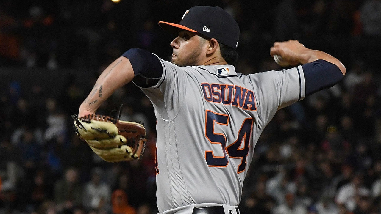 SAN FRANCISCO, CA - AUGUST 06: Roberto Osuna #54 of the Houston Astros pitches against the San Francisco Giants in the bottom of the eighth inning at AT&T Park on August 6, 2018 in San Francisco, California.