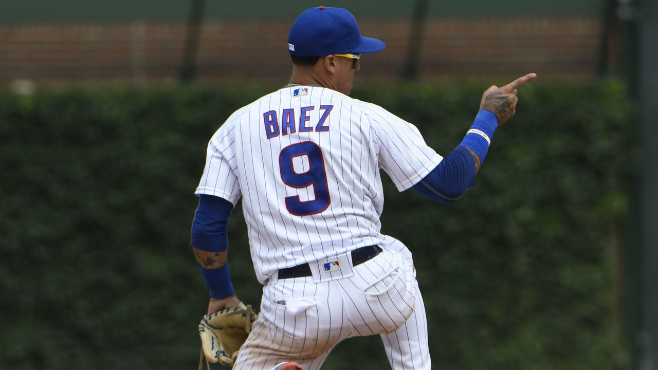 CHICAGO, IL - JULY 21: Javier Baez #9 of the Chicago Cubs reacts after making a play during the ninth inning against the St. Louis Cardinals during game one of a doubleheader on July 21, 2018 at Wrigley Field in Chicago, Illinois. The Cubs won 7-2.