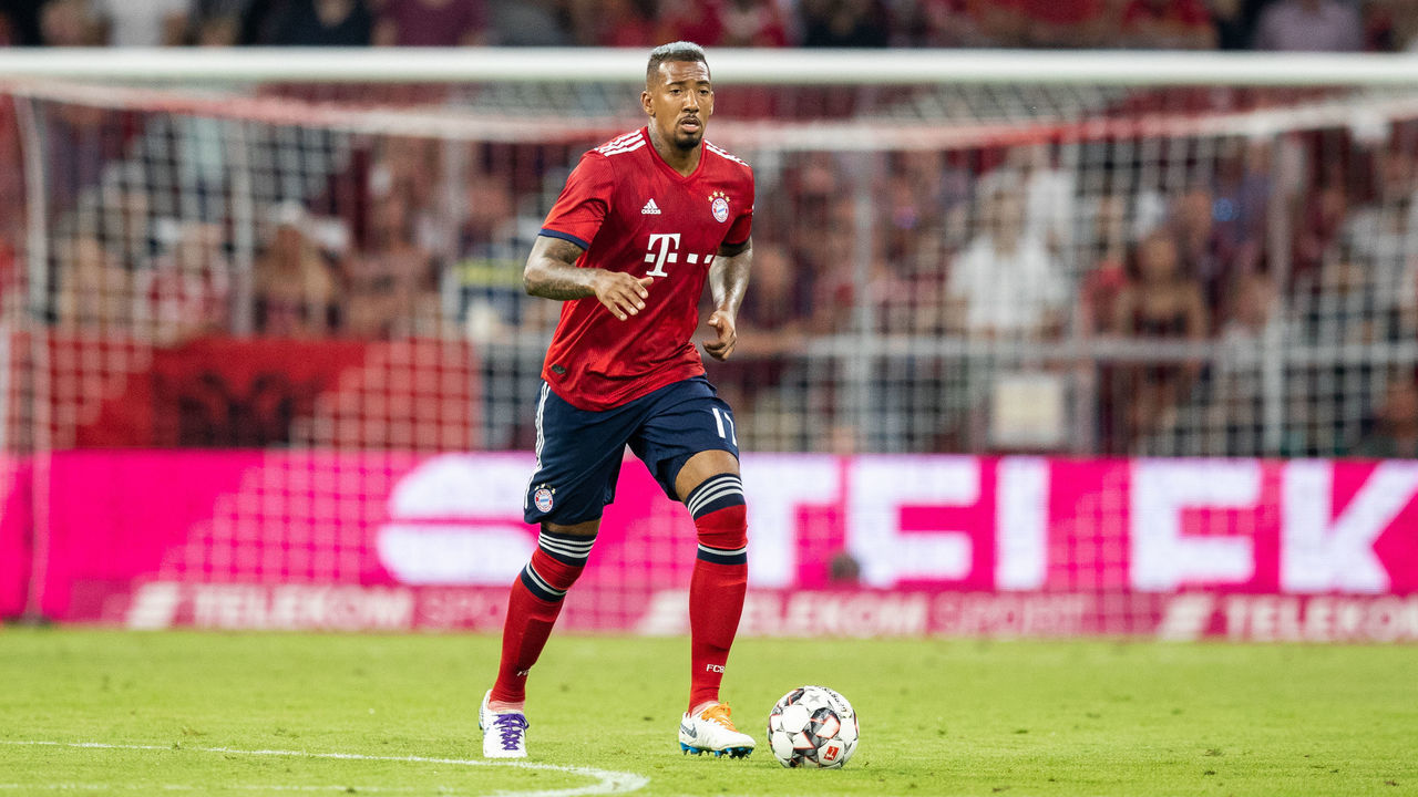 MUNICH, GERMANY - AUGUST 05: Jerome Boateng of FC Bayern Muenchen runs with the ball during the friendly match between Bayern Muenchen and Manchester United at Allianz Arena on August 5, 2018 in Munich, Germany.