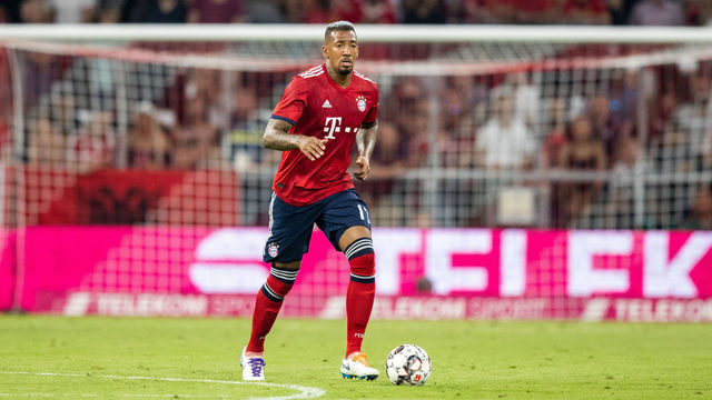 MUNICH, GERMANY - AUGUST 05: Jerome Boateng of FC Bayern Muenchen runs with the ball during the friendly match between Bayern Muenchen and Manchester United at Allianz Arena on August 5, 2018 in Munich, Germany.