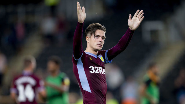 HULL, ENGLAND - AUGUST 06: Jack Grealish of Aston Villa celebrates at the end of the Sky Bet Championship match between Hull City and Aston Villa at KCOM Stadium on August 06, 2018 in Hull, England.