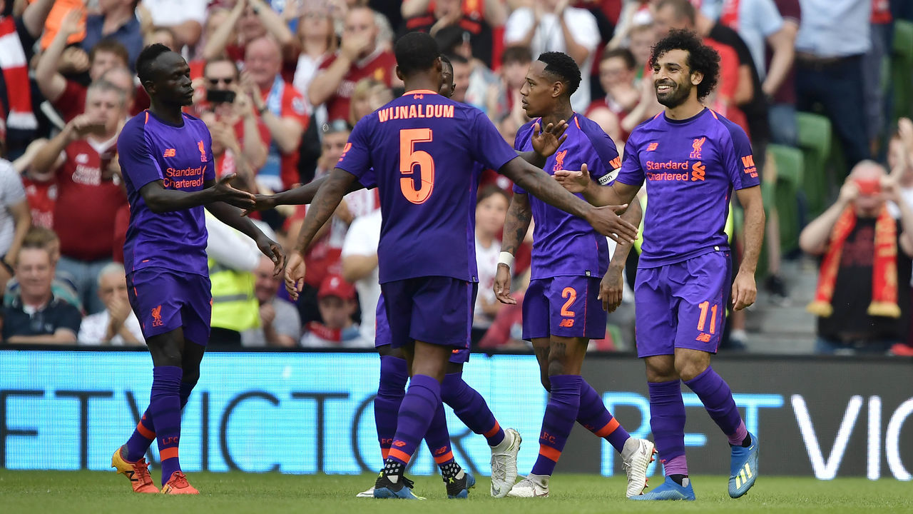 DUBLIN, IRELAND - AUGUST 04: Mohamed Salah of Liverpool celebrates with team mates after scoring during the international friendly game between Liverpool and Napoli at Aviva Stadium on August 4, 2018 in Dublin, Ireland.