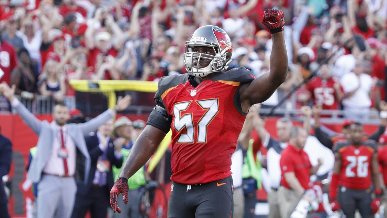 TAMPA, FL - JANUARY 01: Noah Spence #57 and Lavonte David #54 of the Tampa Bay Buccaneers celebrate after a failed two-point conversion attempt by the Carolina Panthers in the fourth quarter of the game at Raymond James Stadium on January 1, 2017 in Tampa, Florida. The Buccaneers defeated the Panthers 17-16.