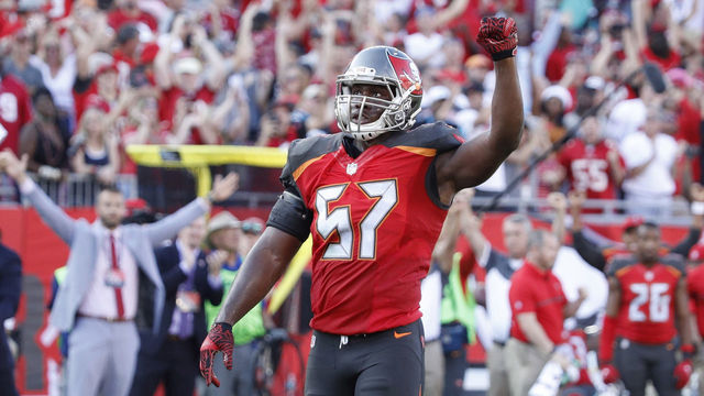 TAMPA, FL - JANUARY 01: Noah Spence #57 and Lavonte David #54 of the Tampa Bay Buccaneers celebrate after a failed two-point conversion attempt by the Carolina Panthers in the fourth quarter of the game at Raymond James Stadium on January 1, 2017 in Tampa, Florida. The Buccaneers defeated the Panthers 17-16.