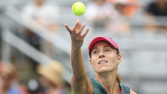 MONTREAL, QC - AUGUST 08: Angelique Kerber of Germany serves against Alize Cornet of France during day three of the Rogers Cup at IGA Stadium on August 8, 2018 in Montreal, Quebec, Canada.