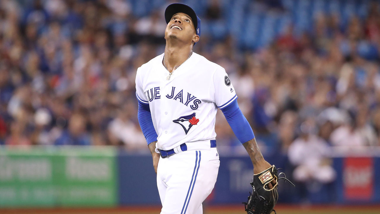 TORONTO, ON - AUGUST 7: Marcus Stroman #6 of the Toronto Blue Jays watches a pop up during MLB game action against the Boston Red Sox at Rogers Centre on August 7, 2018 in Toronto, Canada.