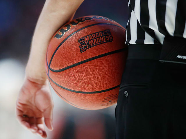 NASHVILLE, TN - MARCH 18: A detail of the March Madness basketball logo as seen during the first half between the Cincinnati Bearcats and the Nevada Wolf Pack in the second round of the 2018 Men's NCAA Basketball Tournament at Bridgestone Arena on March 18, 2018 in Nashville, Tennessee.