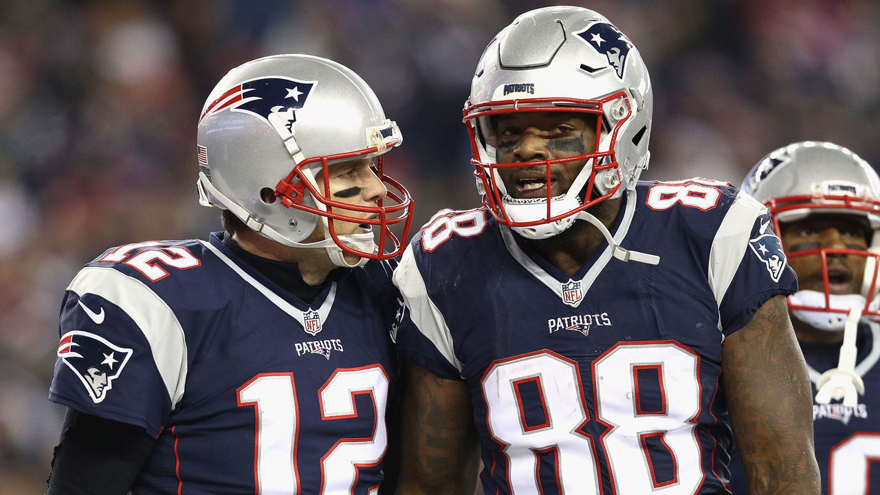 FOXBORO, MA - DECEMBER 12: Tom Brady #12 of the New England Patriots reacts with Martellus Bennett #88 after scoring a touchdown during the third quarter against the Baltimore Ravens at Gillette Stadium on December 12, 2016 in Foxboro, Massachusetts.