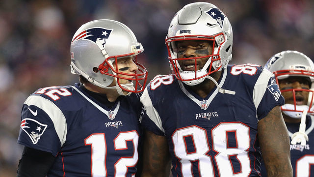 FOXBORO, MA - DECEMBER 12: Tom Brady #12 of the New England Patriots reacts with Martellus Bennett #88 after scoring a touchdown during the third quarter against the Baltimore Ravens at Gillette Stadium on December 12, 2016 in Foxboro, Massachusetts.