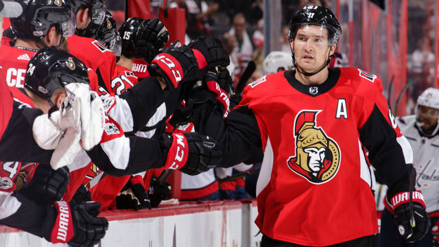 OTTAWA, ON - OCTOBER 5: Mark Stone #61 of the Ottawa Senators celebrates his third period goal and second of the game against the Washington Capitals with teammates at the bench at Canadian Tire Centre on October 5, 2017 in Ottawa, Ontario, Canada.