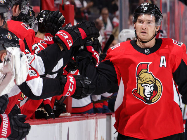 OTTAWA, ON - OCTOBER 5: Mark Stone #61 of the Ottawa Senators celebrates his third period goal and second of the game against the Washington Capitals with teammates at the bench at Canadian Tire Centre on October 5, 2017 in Ottawa, Ontario, Canada.