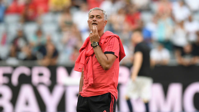 Manchester United's Portuguese manager Jose Mourinho attends the warm up prior to the pre-season friendly football match between FC Bayern Munich and Manchester United at the Allianz Arena in Munich, southern Germany, on August 5, 2018.
