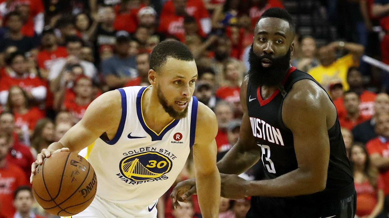 HOUSTON, TX - MAY 28: Stephen Curry #30 of the Golden State Warriors drives against James Harden #13 of the Houston Rockets in the third quarter of Game Seven of the Western Conference Finals of the 2018 NBA Playoffs at Toyota Center on May 28, 2018 in Houston, Texas.