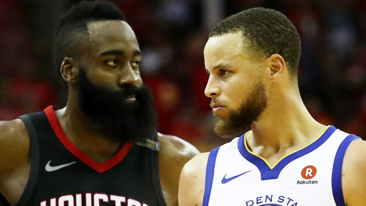 HOUSTON, TX - MAY 28: Stephen Curry #30 of the Golden State Warriors reacts as James Harden #13 of the Houston Rockets looks on in the third quarter of Game Seven of the Western Conference Finals of the 2018 NBA Playoffs at Toyota Center on May 28, 2018 in Houston, Texas.