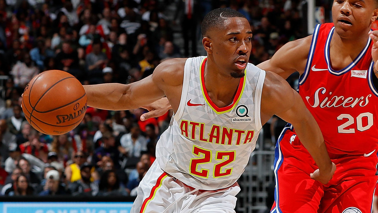 ATLANTA, GA - MARCH 30: Isaiah Taylor #22 of the Atlanta Hawks drives against Markelle Fultz #20 of the Philadelphia 76ers at Philips Arena on March 30, 2018 in Atlanta, Georgia.