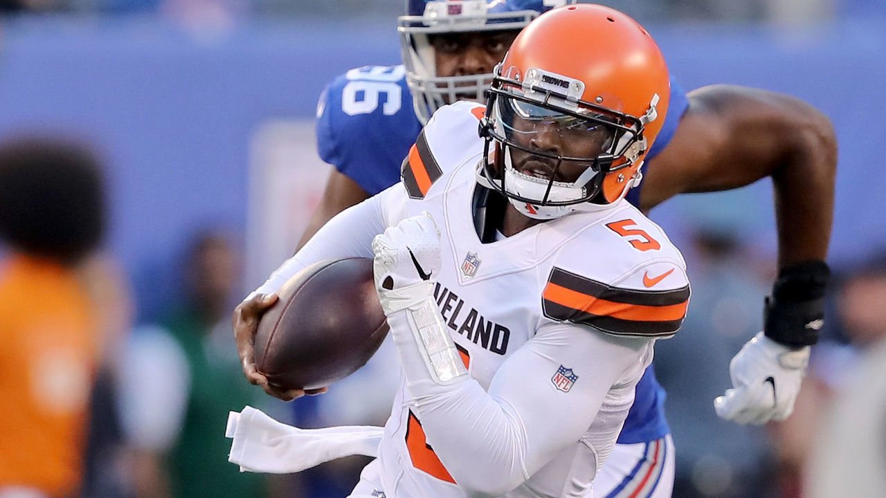 EAST RUTHERFORD, NJ - AUGUST 09: Tyrod Taylor #5 of the Cleveland Browns tries to get the first down as Kareem Martin #96 of the New York Giants defends during their preseason game on August 9,2018 at MetLife Stadium in East Rutherford, New Jersey.