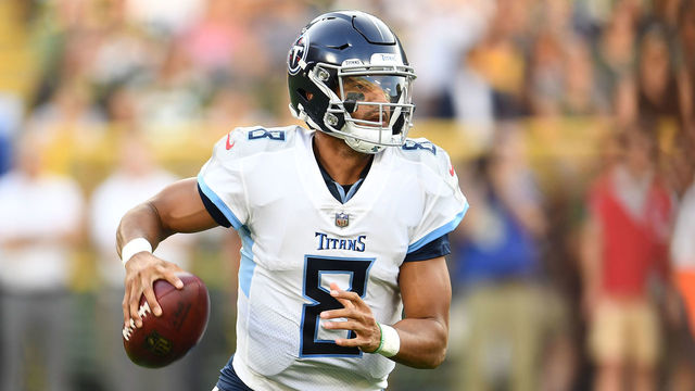 GREEN BAY, WI - AUGUST 09: Marcus Mariota #8 of the Tennessee Titans looks to pass during the first quarter of a preseason game against the Green Bay Packers at Lambeau Field on August 9, 2018 in Green Bay, Wisconsin.