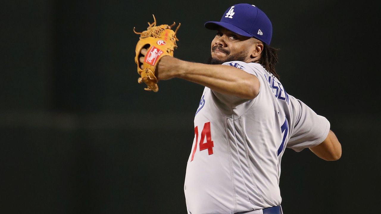 PHOENIX, AZ - APRIL 02: Relief pitcher Kenley Jansen #74 of the Los Angeles Dodgers pitches against the Arizona Diamondbacks during the MLB game at Chase Field on April 2, 2018 in Phoenix, Arizona.