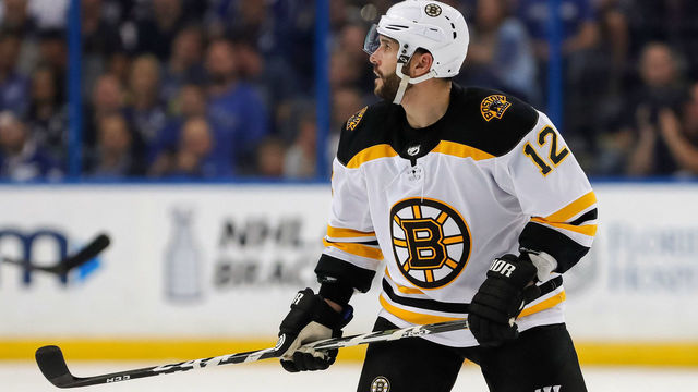TAMPA, FL - APRIL 3: Brian Gionta #12 of the Boston Bruins looks for a pass against the Tampa Bay Lightning during the first period of the game at the Amalie Arena on April 3, 2018 in Tampa, Florida. *** Local Caption *** Brian Gionta