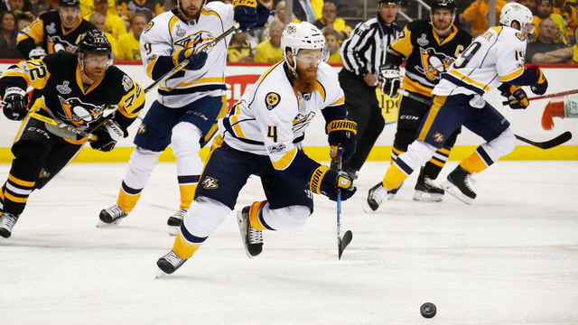 PITTSBURGH, PA - MAY 31: Ryan Ellis #4 of the Nashville Predators skates for a loose puck during the first period in Game Two of the 2017 NHL Stanley Cup Final against the Pittsburgh Penguins at PPG Paints Arena on May 31, 2017 in Pittsburgh, Pennsylvania.