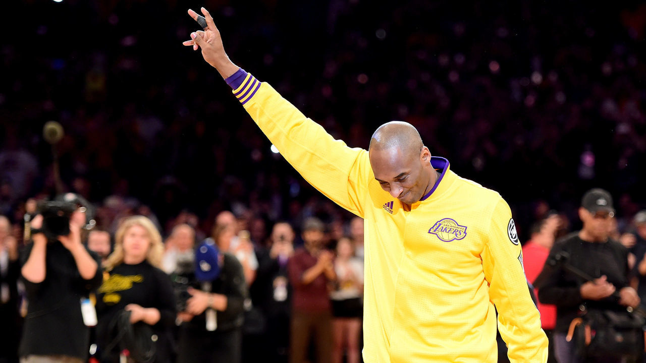 LOS ANGELES, CA - APRIL 13: Kobe Bryant #24 of the Los Angeles Lakers acknowledges the crowd before taking on the Utah Jazz in Bryant's final NBA game at Staples Center on April 13, 2016 in Los Angeles, California.