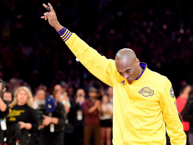 LOS ANGELES, CA - APRIL 13: Kobe Bryant #24 of the Los Angeles Lakers acknowledges the crowd before taking on the Utah Jazz in Bryant's final NBA game at Staples Center on April 13, 2016 in Los Angeles, California.