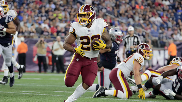 FOXBOROUGH, MA - AUGUST 09: Washington Redskins running back Derrius Guice (29) carries the ball during a preseason NFL game between the New England Patriots and the Washington Redskins on August 9, 2018, at Gillette Stadium in Foxborough, Massachusetts. The Patriots defeated the Redskins 26-17.