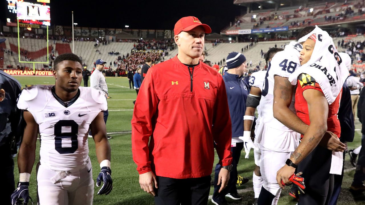 COLLEGE PARK, MD - NOVEMBER 25: Head coach DJ Durkin of the Maryland Terrapins walks off the field following the Terrapins 66-3 loss to the Penn State Nittany Lions at Capital One Field on November 25, 2017 in College Park, Maryland.
