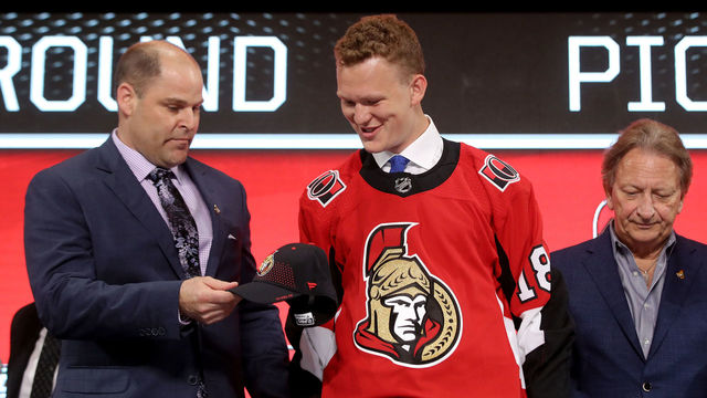 DALLAS, TX - JUNE 22: Brady Tkachuk reacts after being selected fourth overall by the Ottawa Senators during the first round of the 2018 NHL Draft at American Airlines Center on June 22, 2018 in Dallas, Texas.