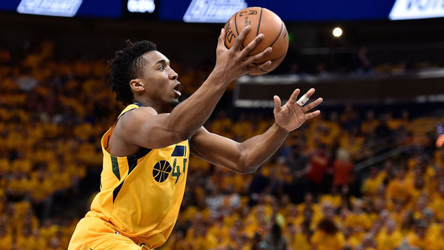 SALT LAKE CITY, UT - MAY 06: Donovan Mitchell #45 of the Utah Jazz goes to the basket in the first half during Game Four of Round Two of the 2018 NBA Playoffs against the Houston Rockets at Vivint Smart Home Arena on May 6, 2018 in Salt Lake City, Utah.